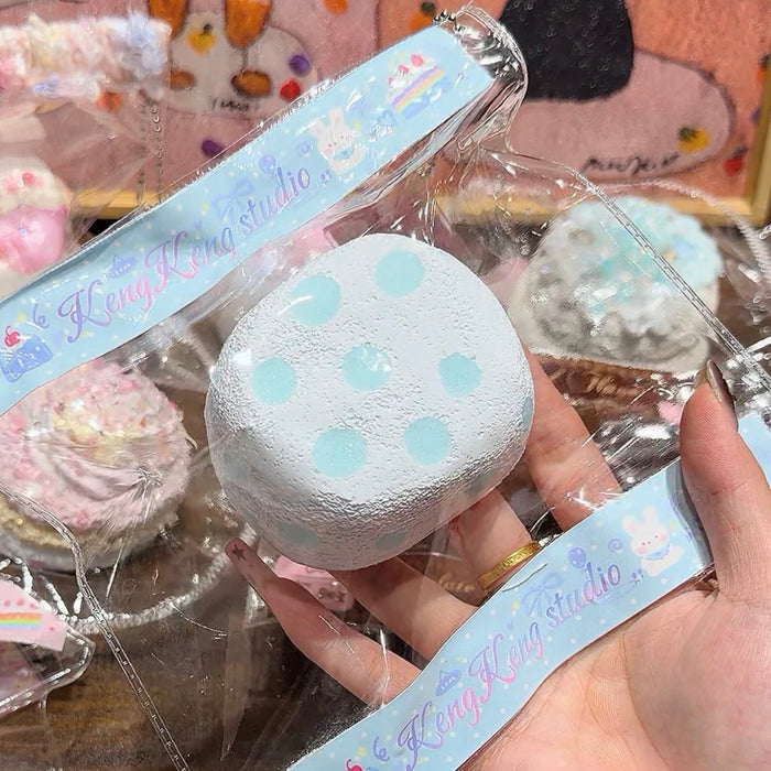 Kengkeng Studio "Blue Polka Dot Senbei" Squishy stress relief toy