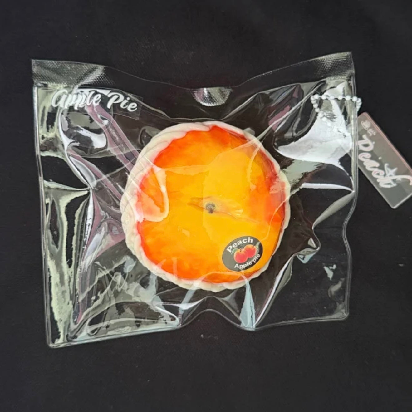 notsweetpie【網袋入り油蟠桃】  Squishy stress relief toy