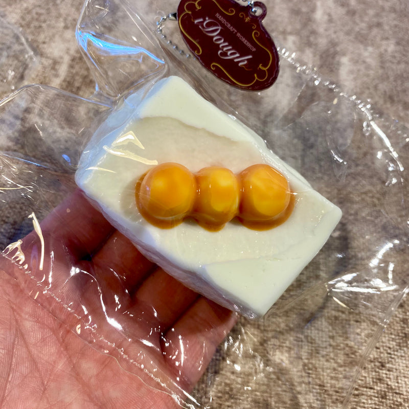 iDough Studio "Charred Dango Mochi" Squishy stress relief toy